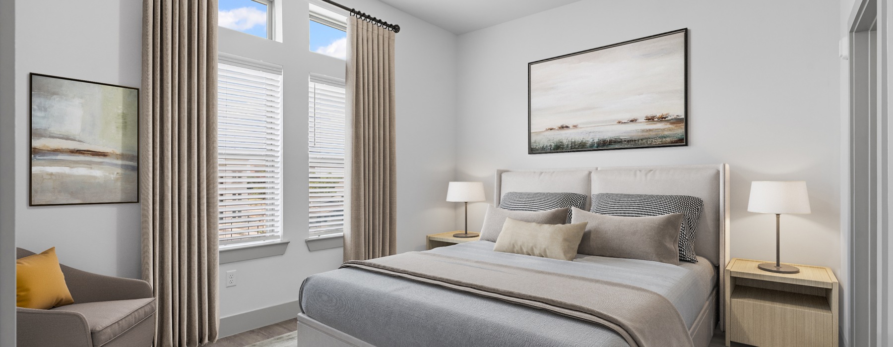 Bedroom with large windows and chair