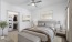 Bedroom with closet and bedding