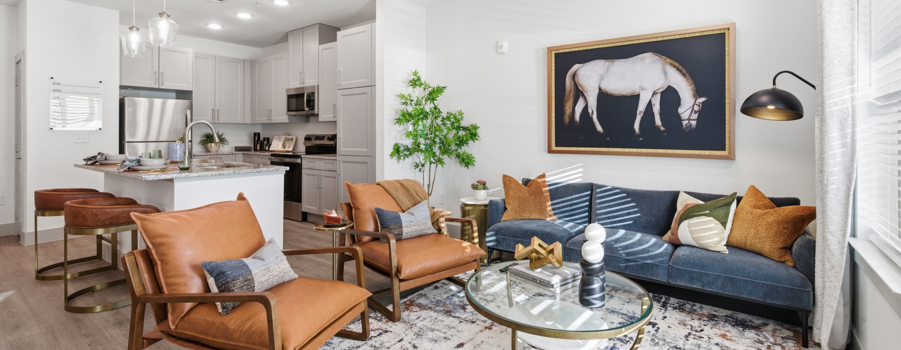 living room with seating and artwork