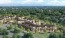 an apartment complex surrounded by trees